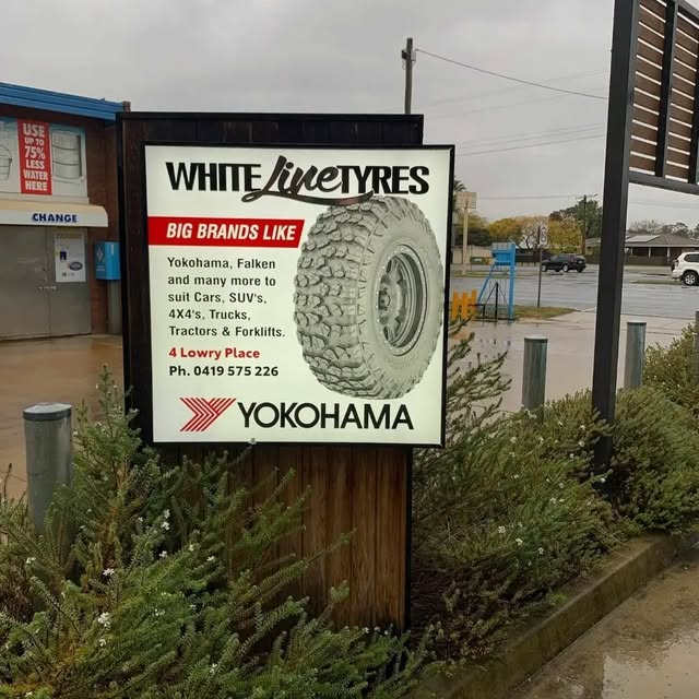 The White Line Tyres roadside sign listing Yokohama, Falken and many more to suit cars, SUVs, 4X4s, trucks, tractors and forklifts